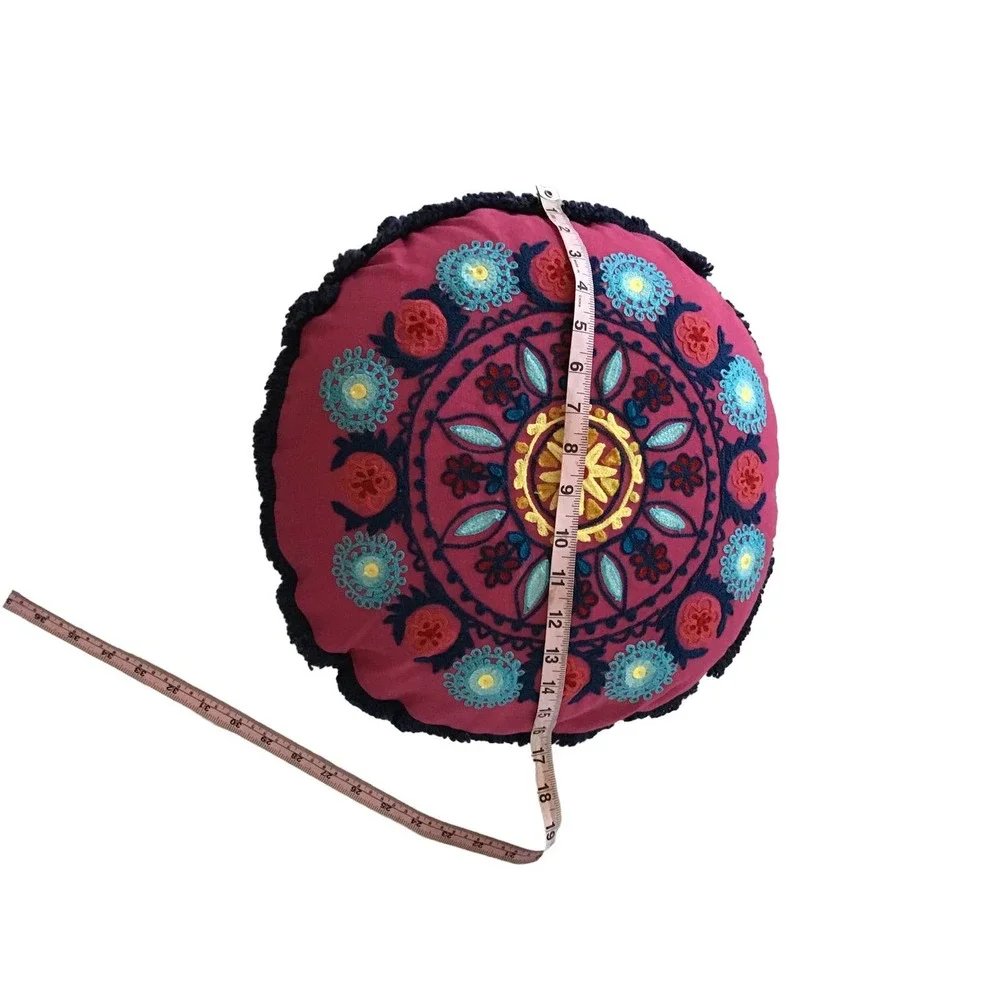 Unk embroidered round